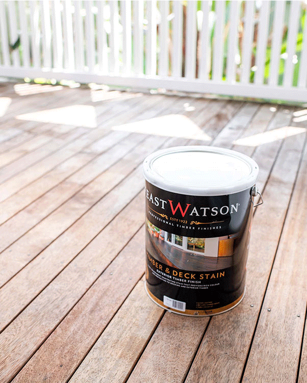 Geneva Vanderzeil applying Feast Watson Timber & Deck Stain in Black Japan