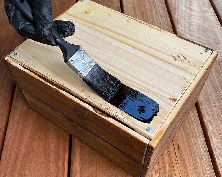 Applying Feast Watson Prooftint to a wooden gift hamper crate.