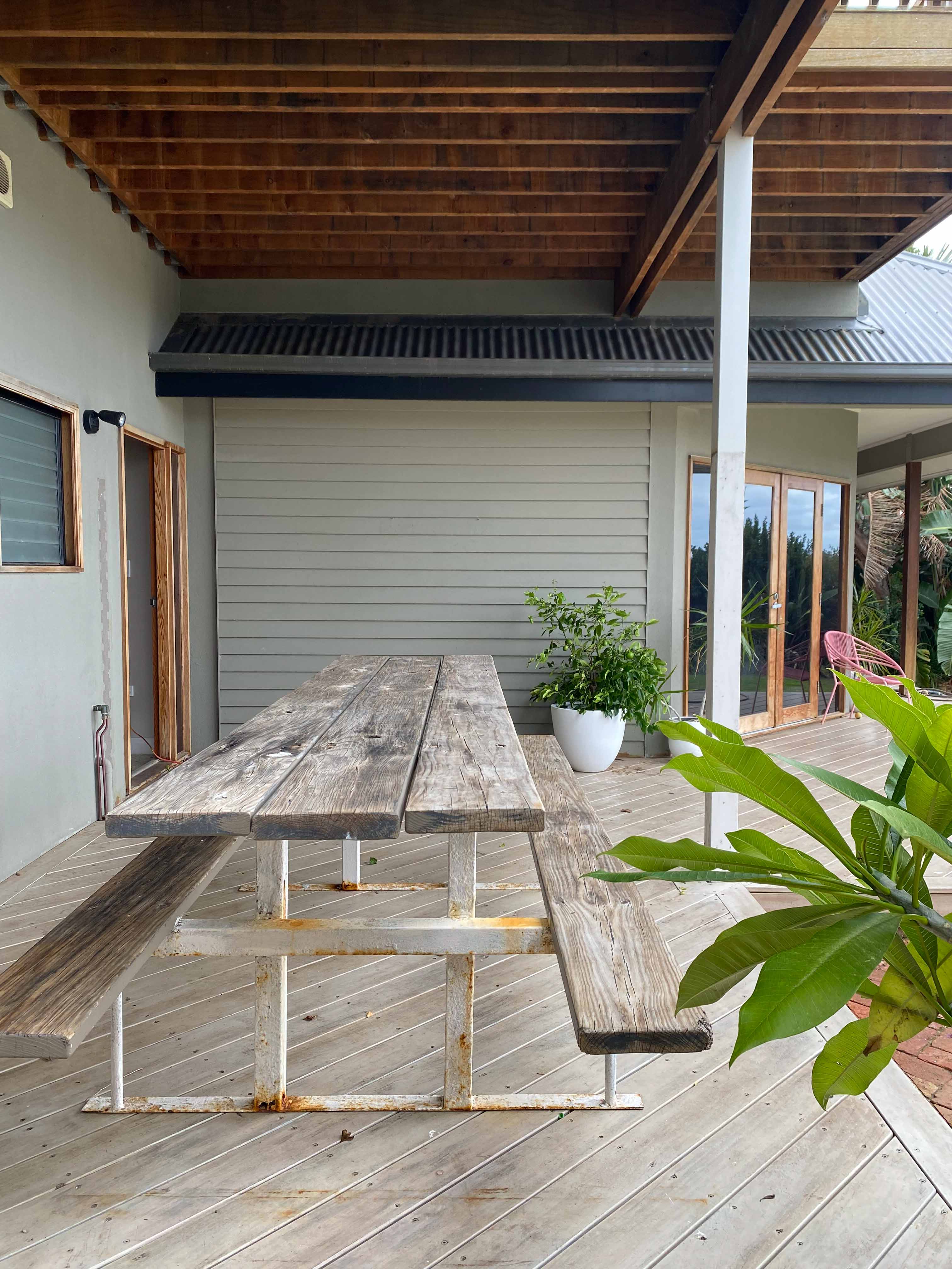 Before shot of The Style Hosts' outdoor timber table refresh project