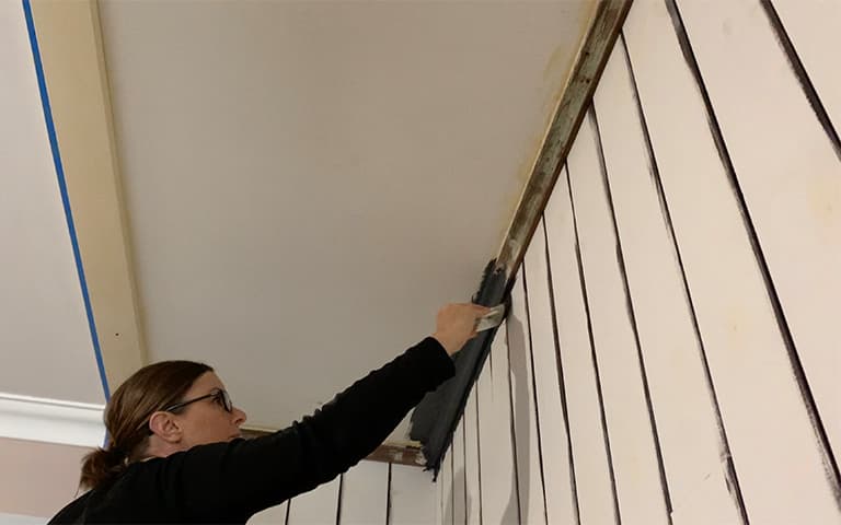 Laundry wall cutting in with paint brush