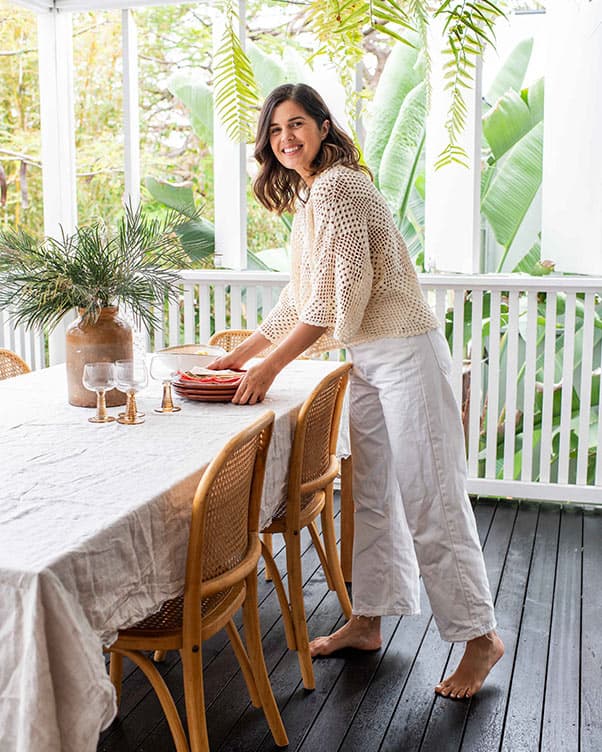 Geneva Vanderzeil on stained timber deck