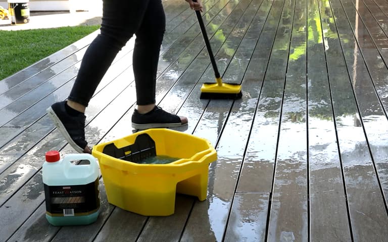 Step Four: Scrub the solution into the timber