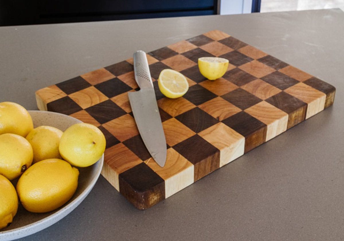Cutting lemons on a chopping board
